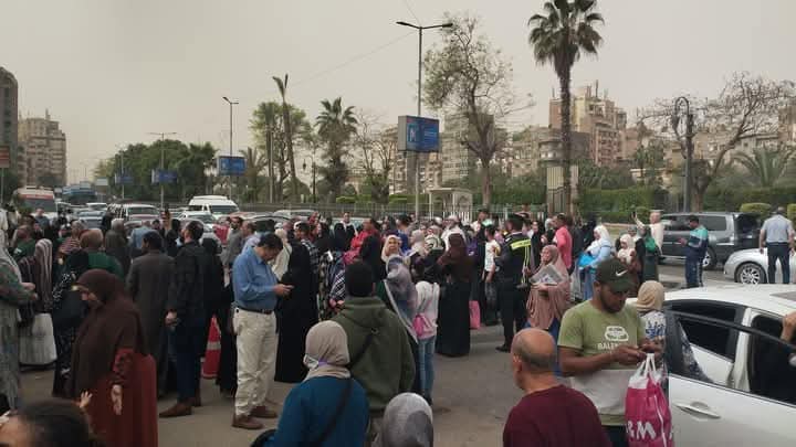 Image taken by residents showing patients and companions standing outside the hospital gate